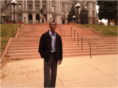 Marvin Cummings in front of the Colorado State Capital.