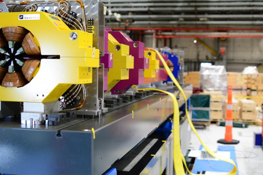 The first completed test module of magnets for the upgraded APS storage ring undergoes testing with vibrating wire to determine the quality of its magnetic field. (Image by Argonne National Laboratory.) 