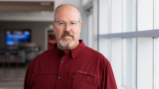 A man’s professional headshot.