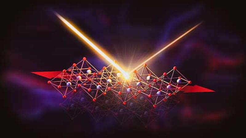 Illustration of an atomic structure as a very bright light diffracts off of it.