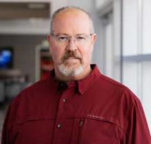 A man's professional headshot.